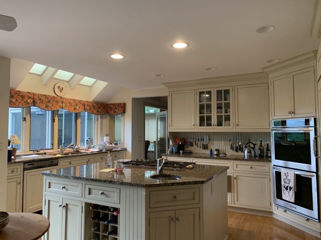 Baird Home Solutions - White painted kitchen cabinets and new countertops